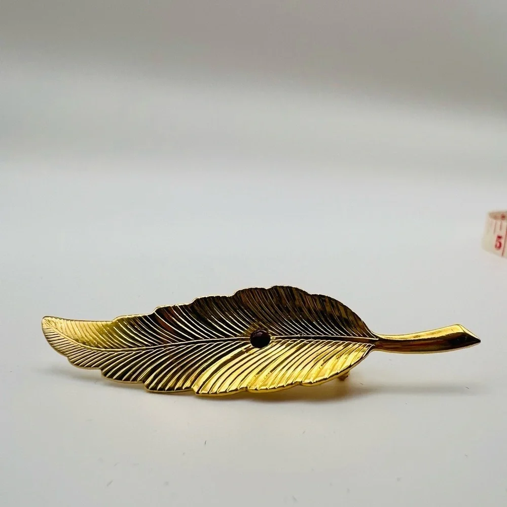 Stylish Gold and Black Feather Pin